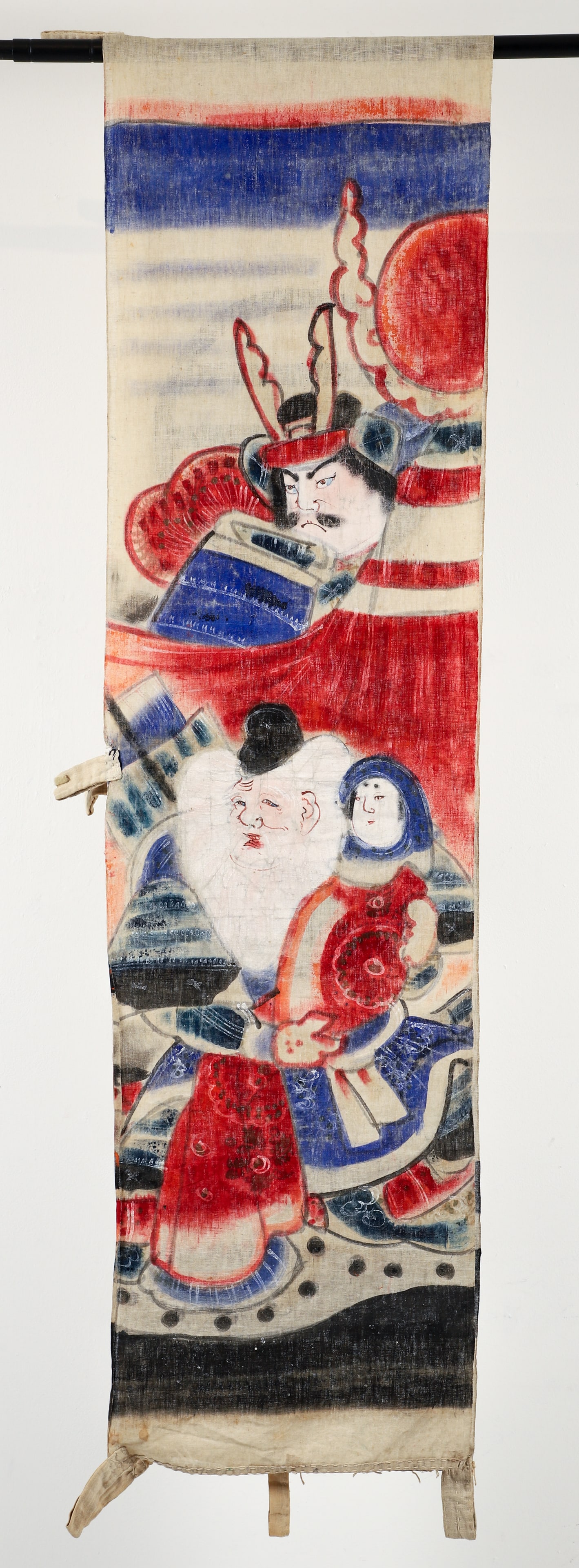 Japanese Hand Painted Nobori Banner: Japanese hand painted linen Nobori (banner). The upper portion with stripes and kamon, lower portion depicting a warrior behind a figure holding a child. Apparently unsigned. 120 x 15.75 inches.