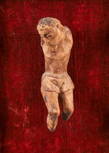 Circa 18th Century Carved Wooden Figure of Christ: Carved wooden figure of the crucified Christ, c.18th century or possibly earlier, mounted against red velvet within gilt and gesso frame, figure 5.5 x 1.75 inches, framed 10 x 8 inches. Provenance: Es