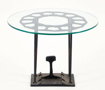 Western PA Railroad Executive Iron and Glass Table: Western Pennsylvania railroad executive iron, rebar, and glass side table. Glass table top support constructed of sliced railroad track. Rebar legs. Base with sliced railroad track at center. Apparent