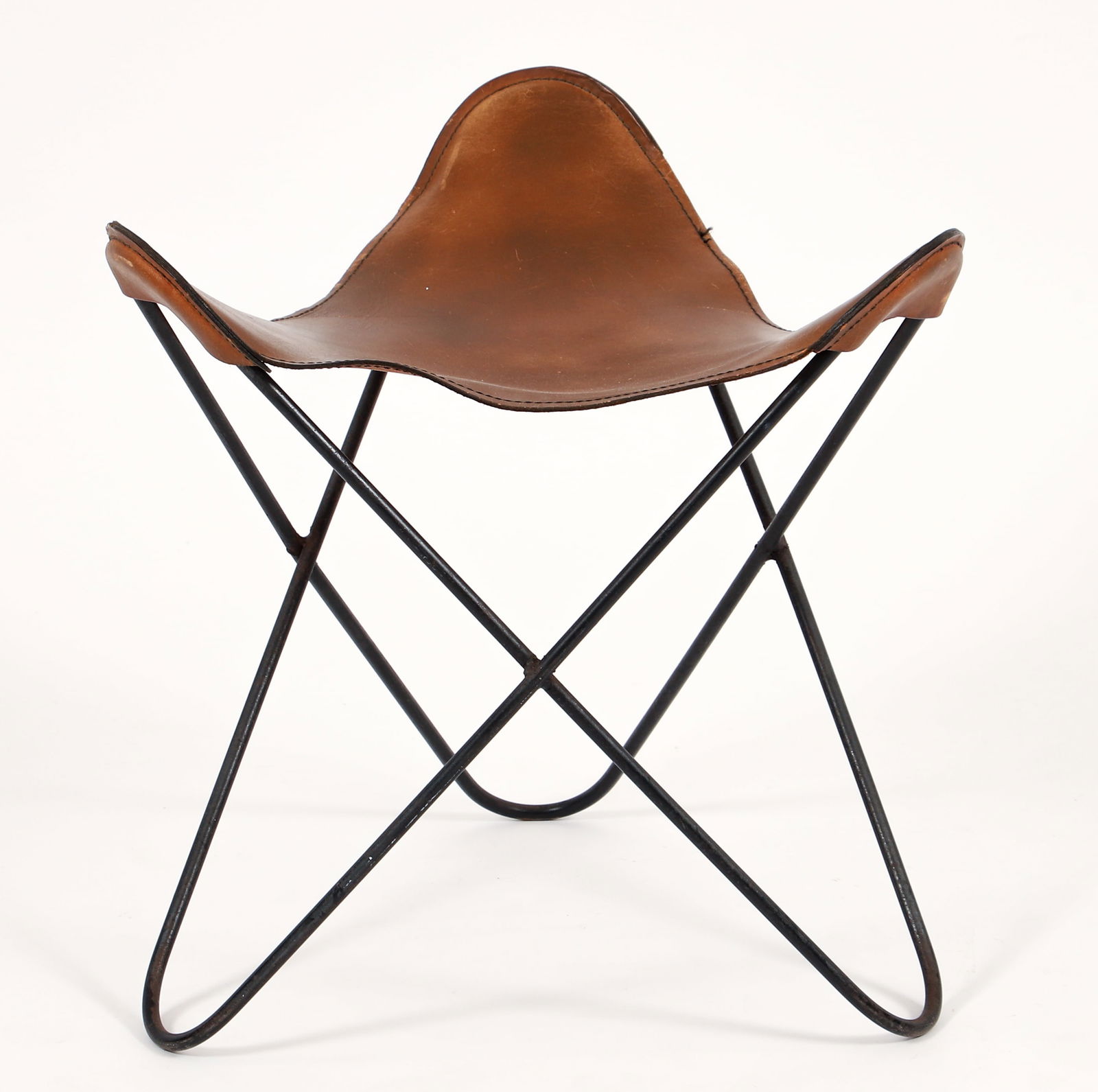 Original BKF Hardoy Leather Butterfly Ottoman: Attributed to Jorge Ferrari Hardoy for Knoll BKF Butterfly ottoman, mid century modern, originally designed in Buenos Aires, Argentina by Antonio Bonet, Juan Kurchan, and Jorge Ferrari Hardoy in 1938.