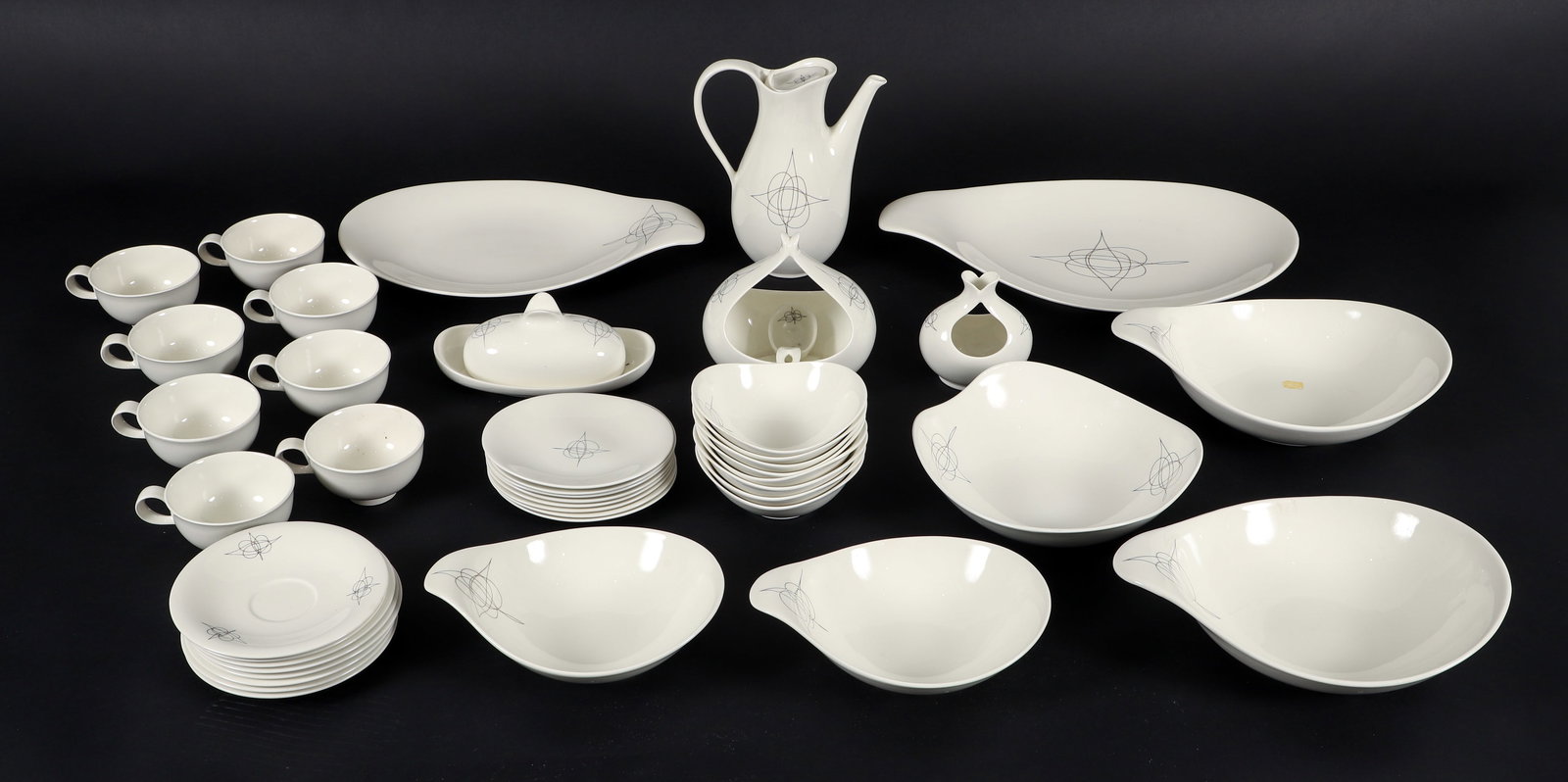 37 Pc Set of Eva Zeisel for Hallcraft Fantasy Dishware: 37 piece set of Eva Zeisel for Hallcraft Fantasy dishware, American, 1950s. Includes: 2 serving platters, 1 gravy boat with ladle, 1 covered butter dish, 1 candle stick, 1 coffee pot, 8 cups, 8 saucer