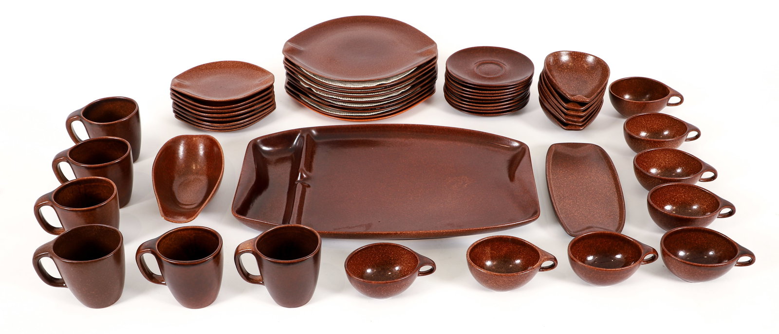 50 Pc Set of Ben Seibel for Roseville Raymor Dishware: 50 piece set of Ben Seibel for Roseville brown glaze Raymor dishware, American, 1952-1954. Includes: 8 dinner plates, 8 small plates, 10 saucers, 8 cups, 6 small bowls, 6 mugs, 1 gravy boat with under