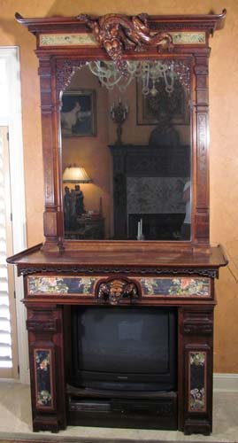 French Chinese Style Elaborately Carved Mahogany Ma: Title: French Chinese Style Carved Mahogany Mantle and Over mantle Mirror inset with metallic and silk embroidery, high relief beautifully carved dragons overhang the canopy and top Medium: carved mah