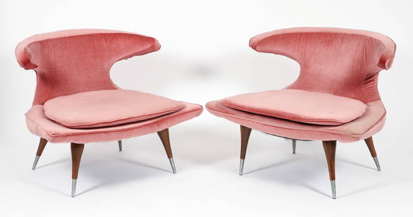 Pair Karpen of California Horn Lounge Chairs: Pair of vintage Karpen of California Horn Lounge Chairs with original peach upholstery, with splayed wooden legs capped in chromed toe guards, 28.5 x 39 x 29 inches