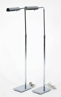 Pair of Koch & Lowy Chrome Floor Lamps: A pair of modernist Koch & Lowy chrome adjustable floor lamps, mid to late 20th century. Cylindrical shades, tubular stem, rectangular base. Stamped Koch & Lowy OMI at necks. Approximately 46.75 x 16