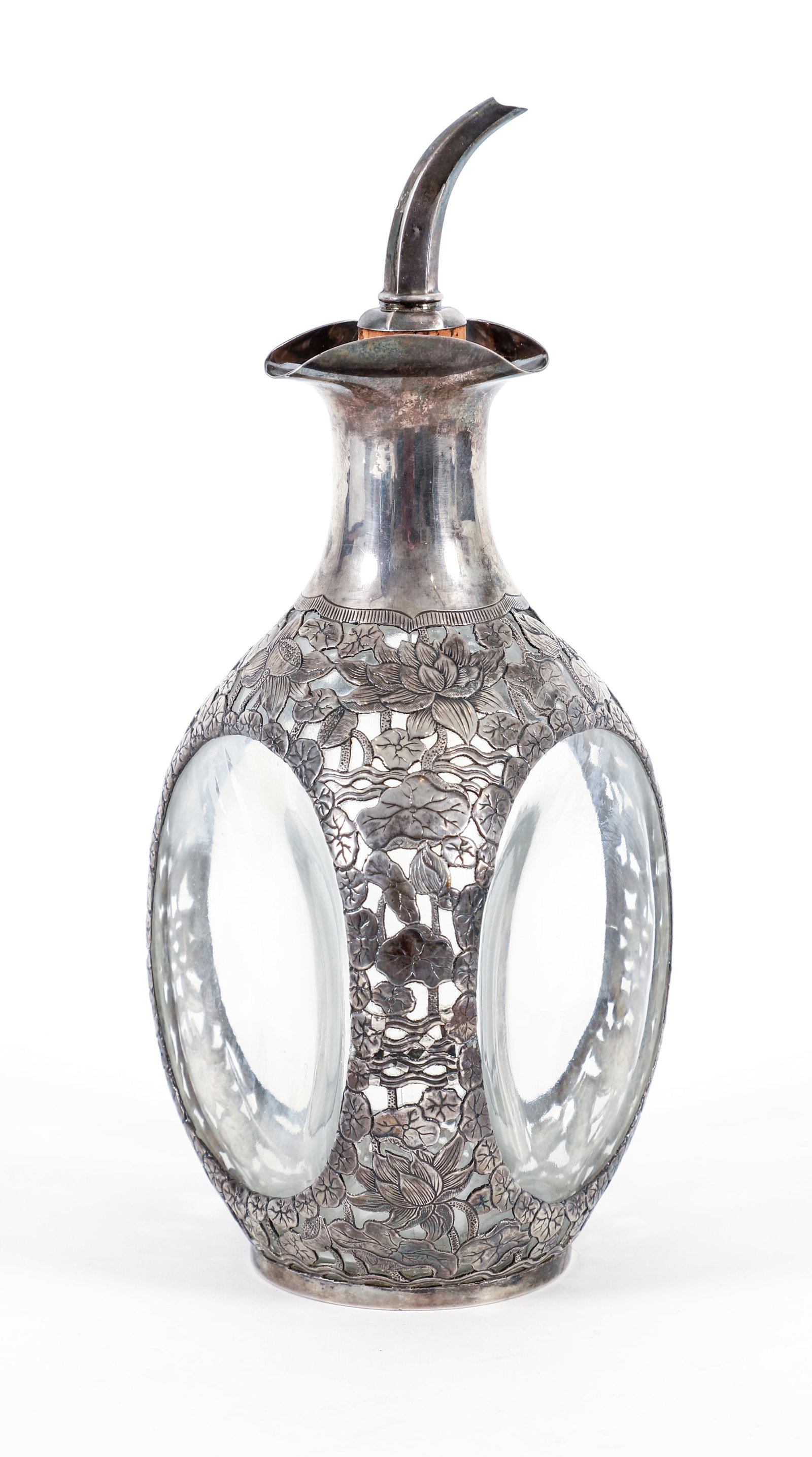 Chinese Sterling Silver encased Glass Haigs Decanter: Chinese Silver encased Glass Haigs Decanter Tackhing Sterling Made in HK with cork spout possibly a replacement, 11 inches tall, with elaborate flower and vine Chinese reticulated decoration. Weighs 2