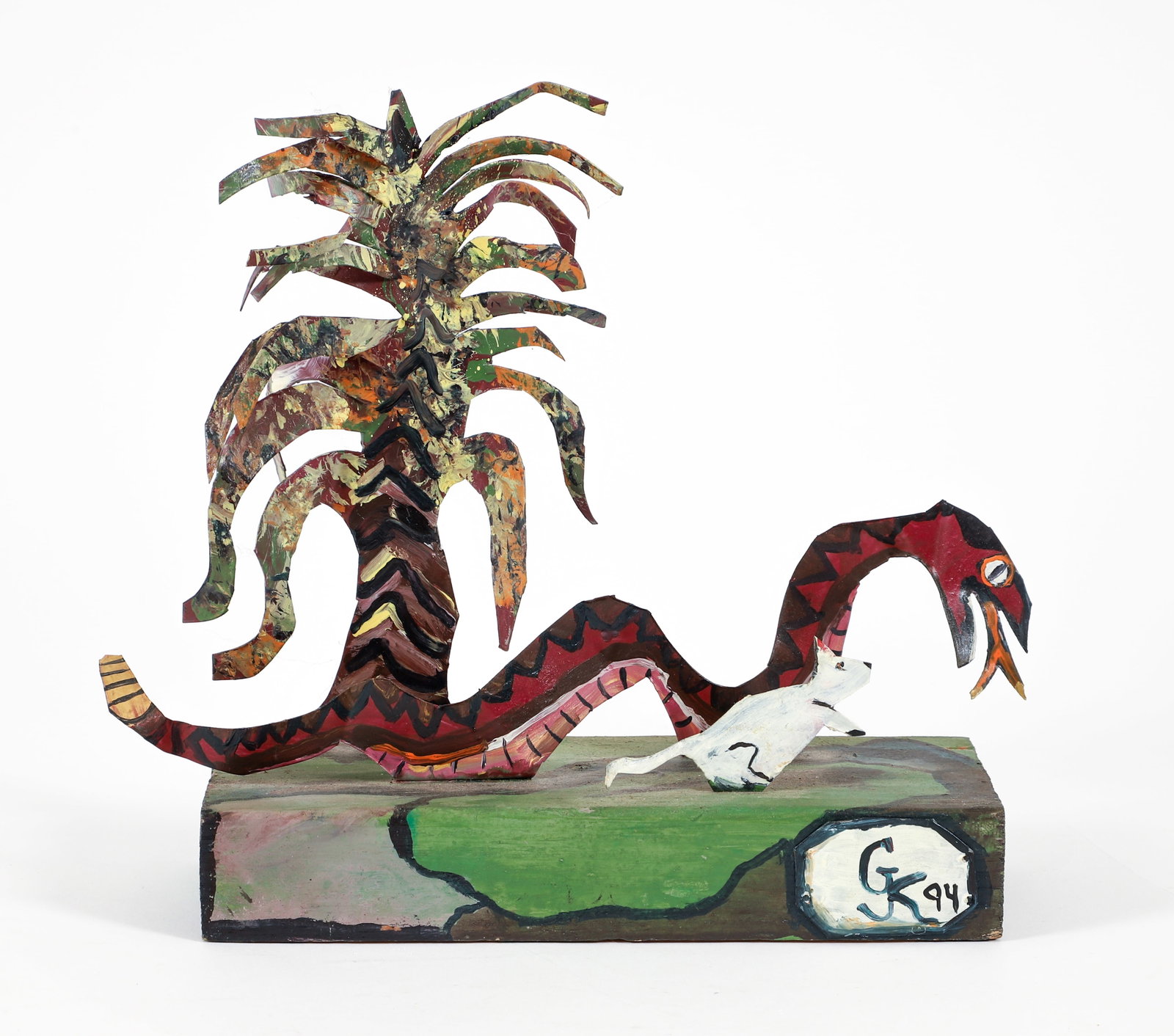 GK 1994 painted metal sculpture Garden of Eden: G. K. (20th Century Visionary School), Serpent and Cat, 1994, painted metal and wood , 9 x 10.5 x 3.5 inches, inscribed GK 94 on the base, Provenance: Virginia Freeman Gallery, Destin Florida,
