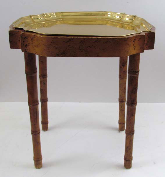 Butler's Table with Fitted Brass Tray: Title: Butler's Tray Table with Fitted Brass Dragooned Tray with faux tiger maple finish and bamboo style legs, Medium: brass and wood Dimensions: 19 x 18 x 18 inches Provenance: Sarreid Ltd.