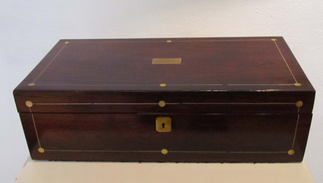Mahogany , brass and mother of pearl inlaid portab: Title: locking with key mahogany inlaid portable writing desk circa 1870, the case with brass string inlay finished with mother of pearl and having a brass escutcheon and name tag, opening to reveal t