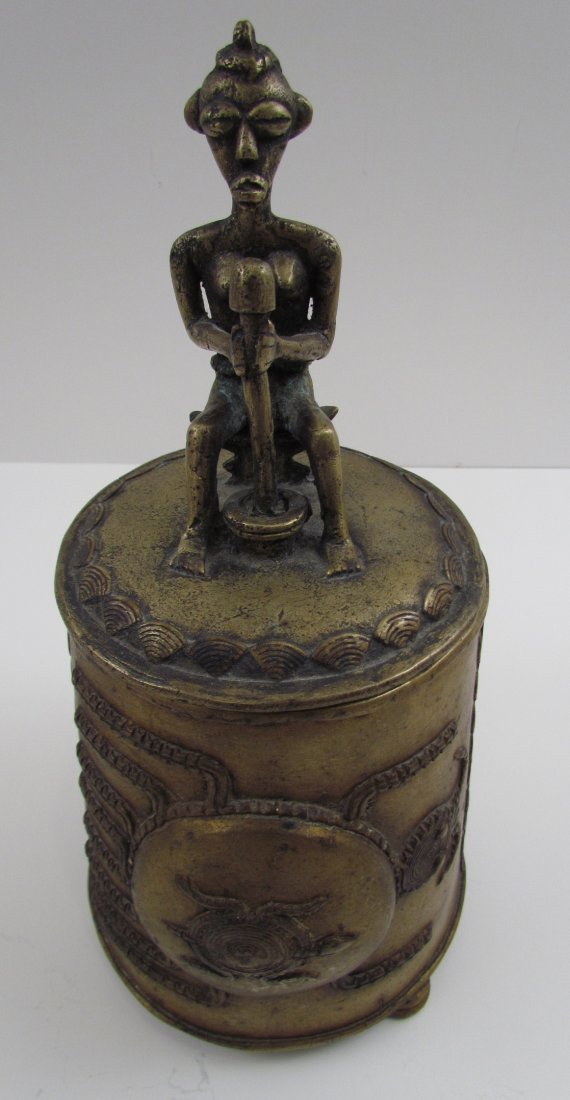 Ghana Brass Vessel with lid: Artist: Ashanti Tribe Title: Ghana Brass Vessel with stylistic decoration and figural lid Medium: welded brass Dimensions: 13 inches tall