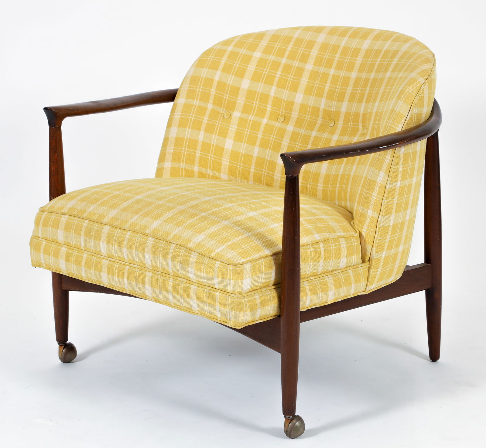 Finn Anderson for Selig Barrell Back Lounge Chair: Finn Anderson for Selig barrel back lounge chair, Danish, 1960s. Walnut frame supporting a newly upholstered seat and back, yellow and cream plaid, floating buttons at back, legs ending in orbit casto