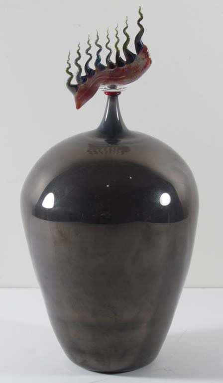 Emilio Santini Glass Vase Hiding: Artist: Santini, Emilio (Italian) Title: Hiding Date: 1998 Medium: flameworked blown glass Dimensions: 12.5 x 6 x 6 inches Description: Grey black glass vase with grey flame lid attached to a 5