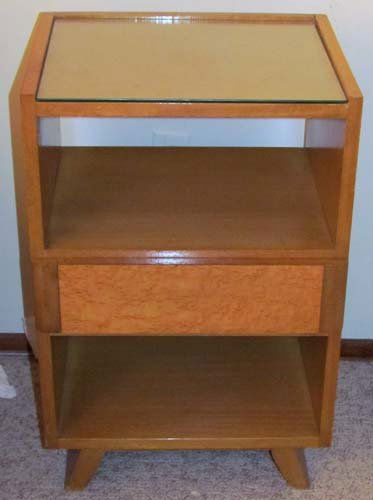 Pair of Saarinen R-Way Mid Century Night Stands: Artist: Saarinen, Eliel for R-Way Title: Pair of Night Stands with One Drawer, Glass Top and Swaged Legs with birds eye maple paneling Date: c. 1950s Medium: maple Dimensions: 29 x 14 x 18.25 inches