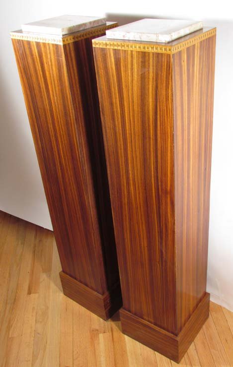 Pair of French Art Deco Zebrawood Pedestals w Marb: Title: Pair of French Zebrawood Art Deco pedestals with inlay design and marble tops Date: ca 1930 Medium: zebrawood, marble Dimensions: 51 x 11 x 11 inches each Provenance: Jerry Pair Antiques, Dania