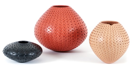 3 Michael Wisner ceramic vases with relief decoration