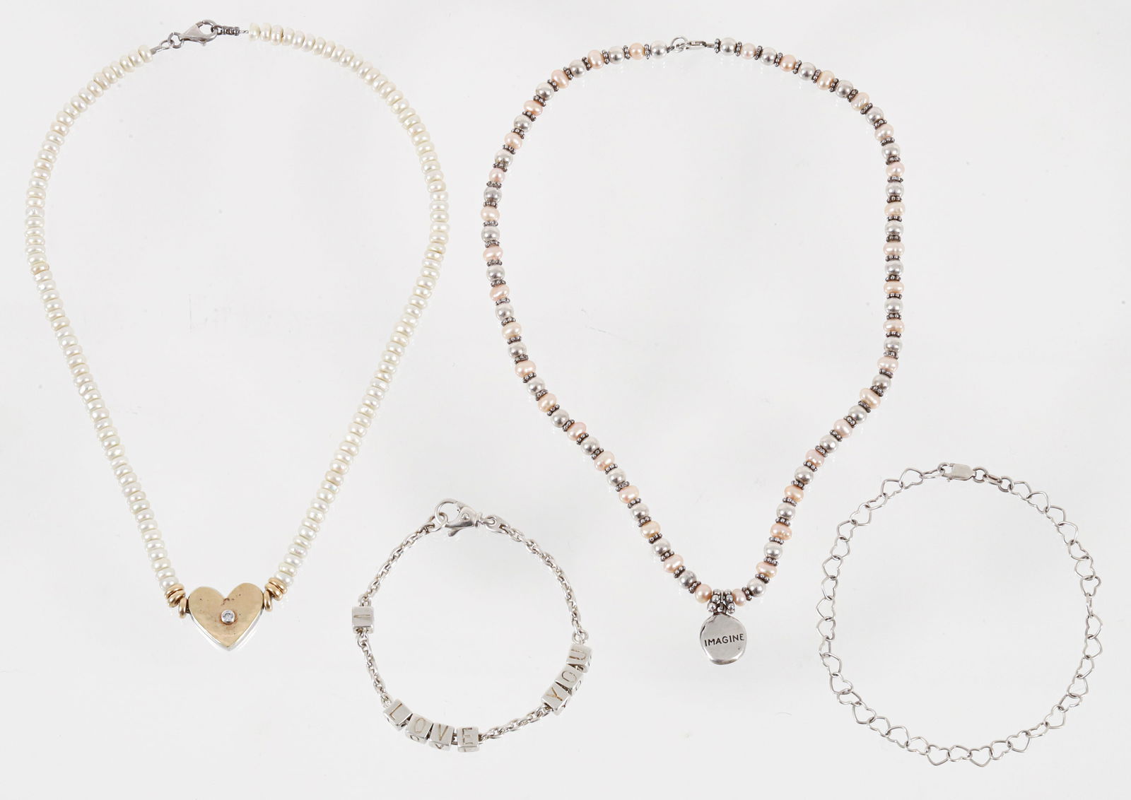 Silver Pearl Decorative Romantic Jewelry: Silver, pearl necklaces and romantic link bracelets. Includes 2 pearl necklaces and 2 silver bracelets. The first necklace is strung with pink seed pears, silver beads and floral inspired rondelle bea