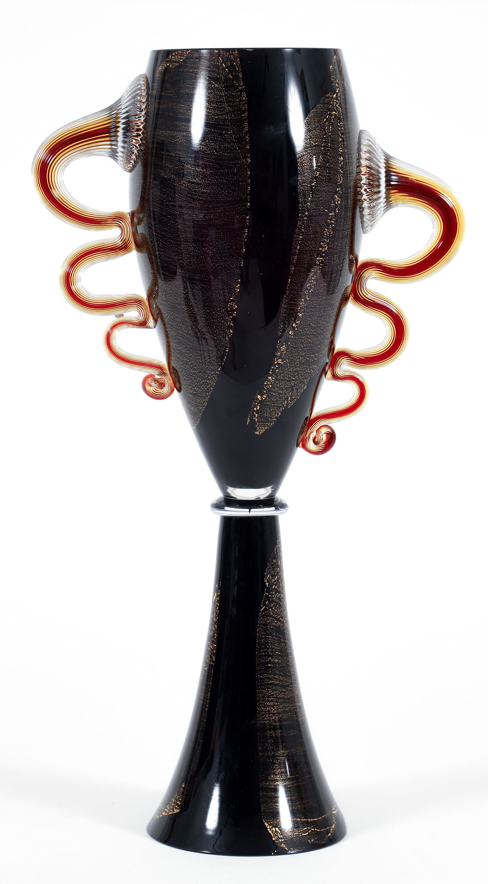 Chip Scarborough Czech Fusion Z Art Glass Urn 2000s: Chip Scarborough for Fusion Z art glass urn, Czech Republic/American, 2000-2009. Deep amethyst/black glass urn with gold leaf elements, flanked by ribbed serpentine handles in deep red and yellow enca