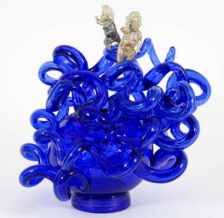 Dale Chihuly Blown Glass Sculpture Blue Venetian 1991: Chihuly, Dale (American, b. 1941), Blue Venetian with Putti amongst coils, 1991, gathered and hot worked glass sculpture, no apparent signature. Cobalt blue and clear spatter glass vessel surrounded b