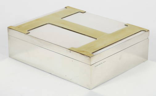 Rare Hermes France 'H' Box Silver Humidor 1970s: A rare Hermes H Box humidor, French, 1975. Silver and gold plated brass humidor box lined in cedar. Gold plated serif 'H' applied to the lid. Silver plated humidifier fitted to the interior of the lid
