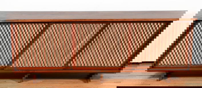 George Nakashima Triple Sliding Door Cabinet: Nakashima, George (Japanese/American, 1905-1990), Triple Sliding Door Cabinet, mid 20th century, walnut case, free-edge front top surface, three grilled sliding doors backed with Pandanus cloth, right