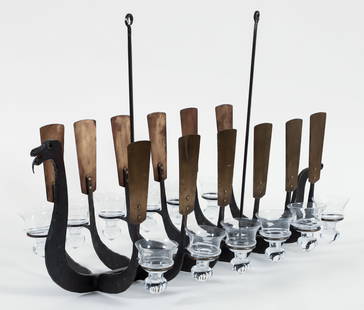 Bertil Vallien Modernist Dragon Boat Chandelier: Vallien, Bertil (Swedish, contemporary), Dragon Boat Chandelier, wrought iron and blown glass, apparently unsigned, 21.75 x 36 x 17 inches. Comes with 14 glass cups -- 12 for the chandelier plus 2 ext