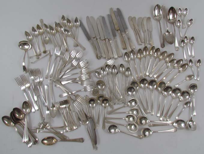 148 pc WATSON STERLING "LOTUS" FLATWARE SERVICE: Title: WATSON STERLING "LOTUS" FLATWARE SERVICE, monogrammed JMC including: tongs, serving ladle and fork, pickle fork, 12 knives, 12 butter knives, 12 shrimp forks, 12 dinner forks, 11 salad forks, 1