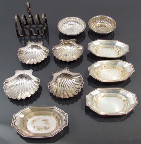 Asst sterling finger bowls/ salt cellars & Plate Toast : Artist: Gorham, Barker Brothers Silverplate Title: sterling finger bowls or salt cellars in 3 patterns: Shell, Bowl with Gadroon detail & monogram, Octagonal with bead detail, with a silverplate toast