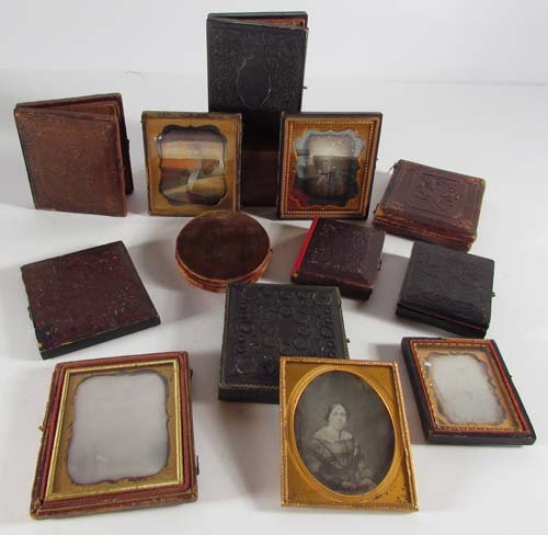 14 Daguerreotypes and tintypes: Title: 14 Assorted Daguerreotypes and tintypes in Cases Medium: daguerreotype Dimensions: largest daguerreotype 3.25 x 2.75 inches, smallest 2.5 x 1.75 inches Frame Type: 12 leather cases, 1 without, 