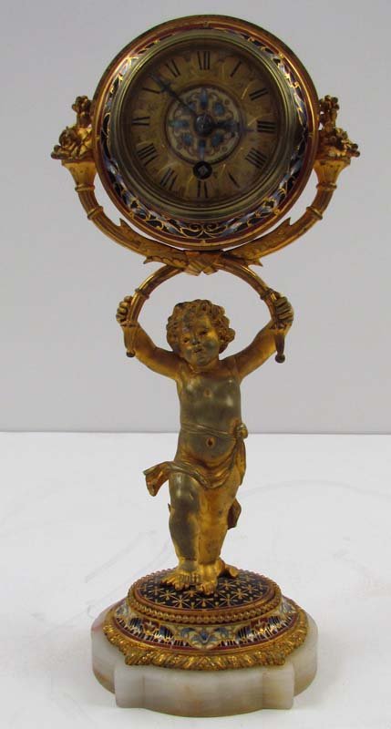French Rococo Style Cloisonné Desk Clock: Artist: Dufaud, Paris" and "Made in France, dial inscribed Spaulding and Co., Chicago and Paris Title: Late 19th or Early 20th Century. Ornate rococo style cloisonné clock with ormolu trim and cherub