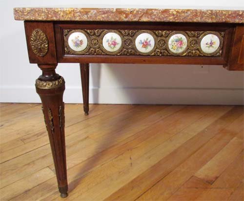 FRENCH LOUIS XVI STYLE MAHOGANY WITH MARBLE TOP: Title: FRENCH LOUIS XVI STYLE MAHOGANY WITH MARBLE TOP COFFEE TABLE with Porcelain medallions fitted in frieze. Printed roundels in apron with attractive floral paintings in the roundels and rose colo
