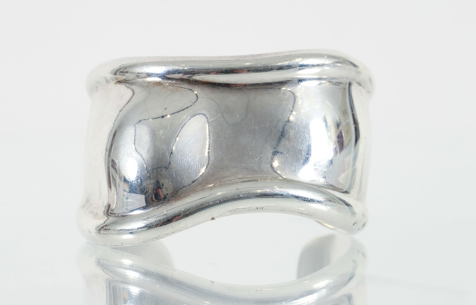 Elsa Peretti for Tiffany Sterling Silver Medium Bone Cuff: Elsa Peretti, for Tiffany and Co., Medium Bone Cuff, 1978, sterling silver, maker's marks, date and Italy stamped on the inside, exterior measurement is 61mm wide (approximately 2.4 inches). Total wei