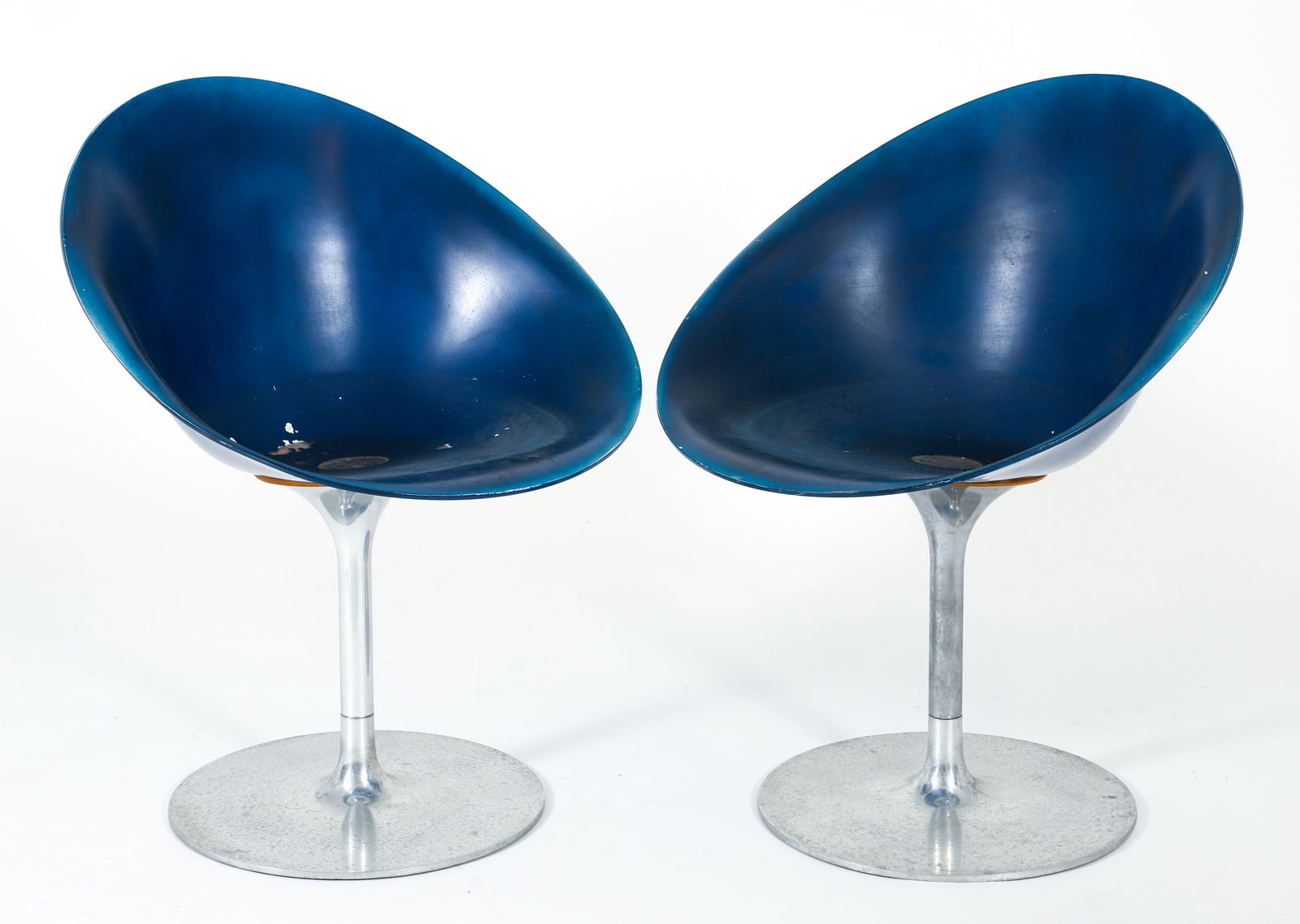 Pair of Philip Starck for Kartell Eros Swivel Chairs: Pair of Philippe Starck (French, b.1949) for Kartell Eros swivel chairs in blue, Italian, mid century modern. Molded Lucite seats with blue lacquer on the interiors. Chromed pedestal bases. Appropriat