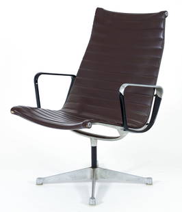 Eames for Herman Miller Aluminum Group Chair: Charles and Ray Eames for Herman Miller Aluminum Group Executive chair, 1958/1959. Brown Naugahyde upholstery. Molded Herman Miller stamp on the underside of the cross bar. 34.75 x 24.5 x 22 inches.