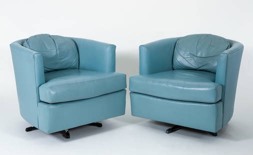 Pair of Light Blue Leather Drexel Barrel Back Swivel Chairs: Pair of Drexel Heritage Leather barrel back swivel chairs in light blue leather, American, late 20th century. Labels and leather samples under each seat. Approximately 27 x 29 x 30 inches.