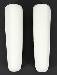 Pair of Frosted Vanity Lights: Pair of mid 20th century vanity lights. Formed frosted glass shades set in grey metal cases. Apparently unlabeled. 18.5 x 4.5 x 6.25 inches.