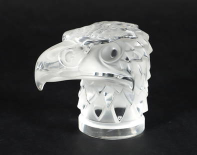 Crystal Lalique Tete D'Aigle (Eagle Head) Sculpture: Lalique crystal Tete D'Aigle (eagle head) car mascot/paperweight/sculpture, France, post war. Lalique France incised at underside. 4.5 x 5.5 x 3.5 inches.