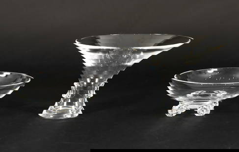2 pc Steuben Footed Bowl and Trumpet Bouquet Vase: 2 pc Steuben glass vase and bowl. Trumpet bouquet vase designed by George Thompson for Steuben, pattern No. 7985, incised "Steuben" on underside, measures 6 x 9 inches. Four footed crystal glass bowl,