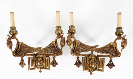 Pair of Brass Empire Style Wall Sconces: Pair of brass and gold tone Empire style wall sconces, 20th century. Two lights each rising on crane or swan motif arms. Apparently unsigned and unlabeled. 13 x 10