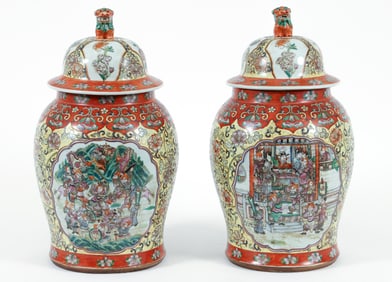 Pair of Famille Rose Fu Dog lidded Ginger Jars