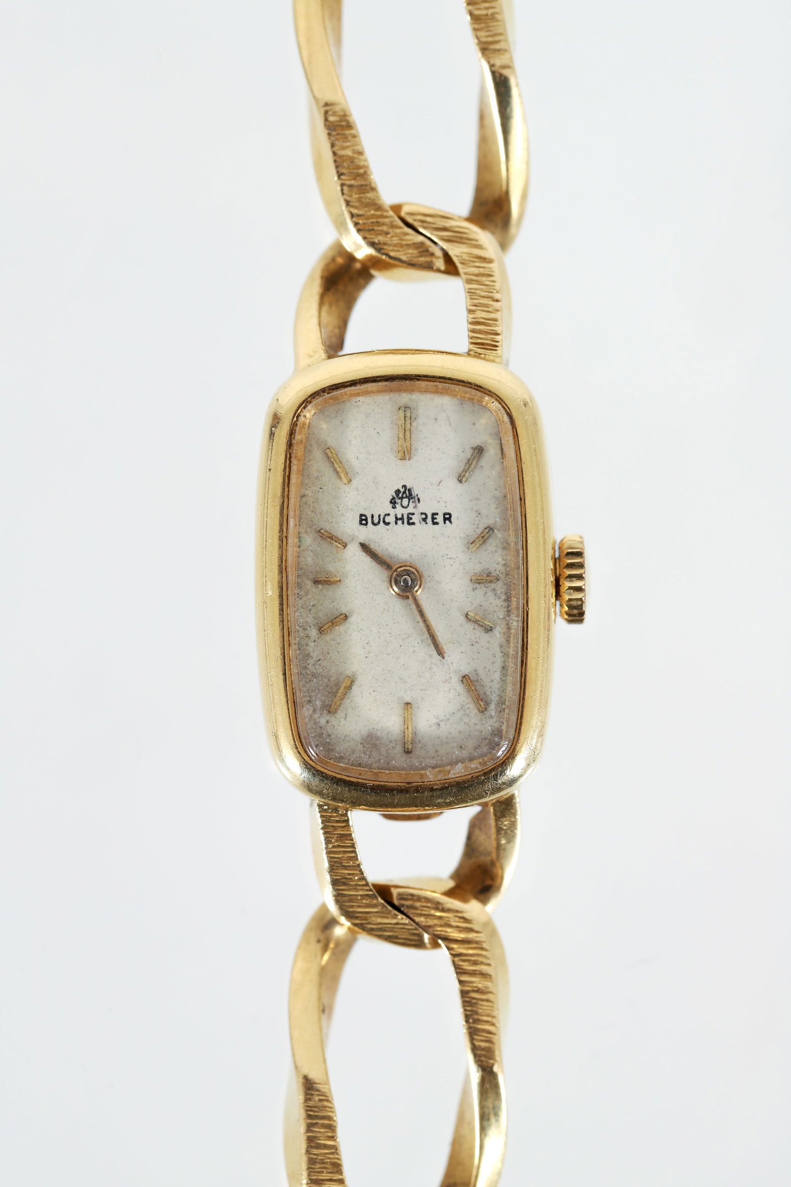Bucherer 18k Gold Chainlink Womens Wristwatch: Bucherer 18k Gold Chainlink Womens Wristwatch, manual wind, 18k yellow gold, marked "18k 0.750 221 57401" at back of face, "750 CB" at back of clasp and "Bucherer" at face, box clasp with double safet
