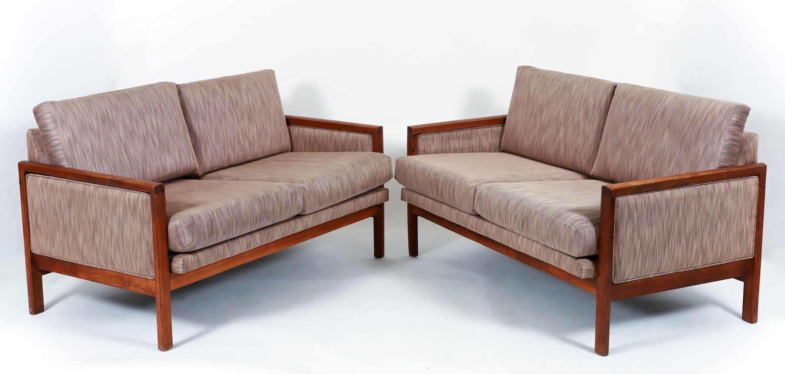 Pair of Giacomo Buzzitta for Stow and Davis Settees 1960s: Pair of Giacomo Buzzitta (American/Italian, 1910-1989) for Stow and Davis Company walnut settees, Grand Rapids, MI. 1960s.