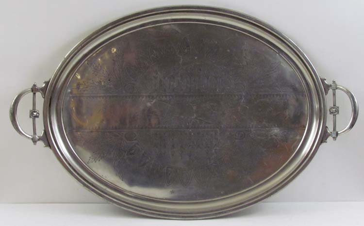 mid 19th Century Victorian Silverplate serving platter: Title: Large Victorian Silverplate serving platter with handles and engraved naïve Egyptian floral decoration Medium: silverplate with wire strengthened patent 1867 Dimensions: 32 x 20 inches Provena