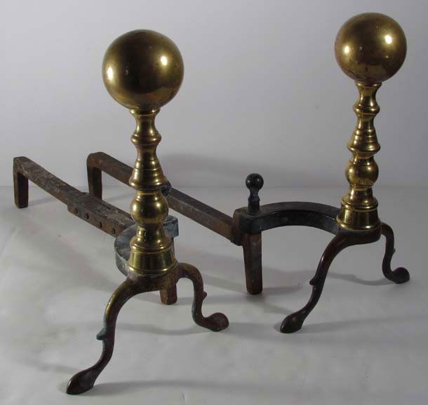 Pair of Brass Ball Andirons: Title: Pair of Brass Ball Andirons Medium: brass, wrought iron Dimensions: 14 x 21 x 8.5 inches Provenance: Frances Sunstein Balter Collection