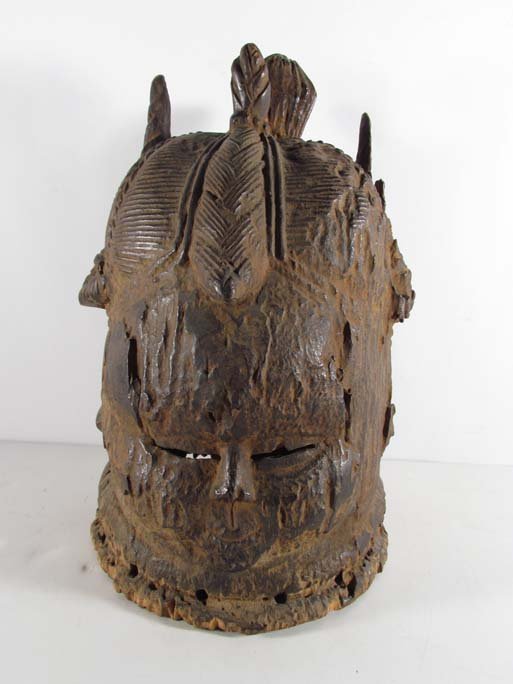 BUNDU HELMET MASK Prov. Jay Leff Collection: Artist: Mende Tribe, Sierra Leone Title: Sande Society Mende Helmet Mask or Bundu Helmut Mask Date: late 19th Century or Early 20th Century Medium: wood with aged patina Dimensions: 13 x 9.25 x 10 in