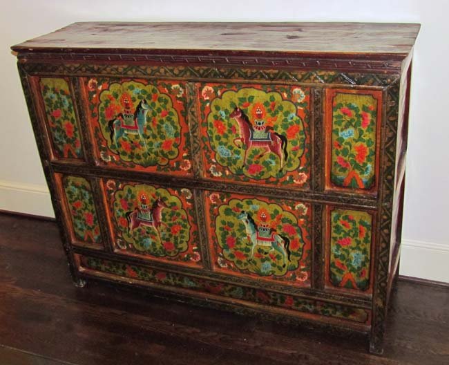 Painted Spanish Country Chest: Title: Painted Spanish Country Chest with horse and floral decoration, carved with two large cabinets Date: 19th century, possibly earlier Medium: painted wood Dimensions: 40.5 x 50.5 x 15.75 inches P