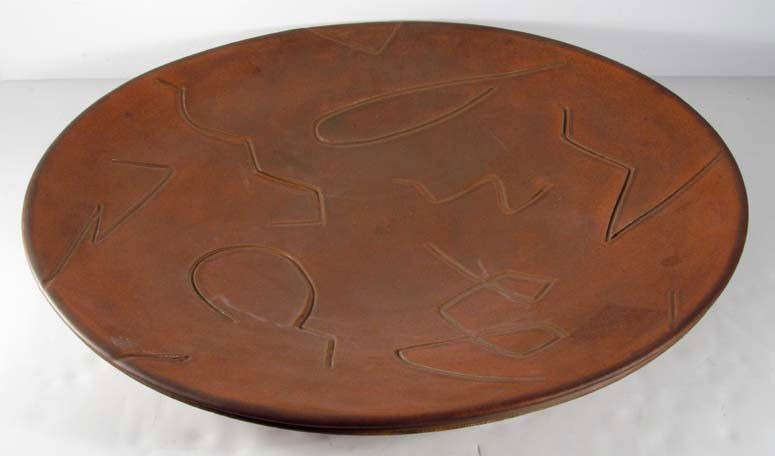 Large Earthenware Charger by Gintz or Grutz: Artist: Grintz or Grutz Title: Large Earthenware Charger Date: 1982 Medium: clay Dimensions: 3 x 24 x 24 inches Signature: incised signature on reverse Gintz or Grutz 1982