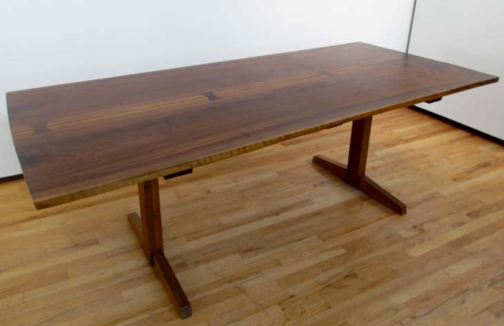 Nakashima Persian Walnut Trestle Table w/2 leaves: Artist: Nakashima, George (Japanese American, 1905 - 1990) Title: Persian Walnut Trestle Table SK 2bd with 2 Leaves/Extenders (slide into each end), 4 butterflies Date: 1983 Medium: walnut Dimensions: