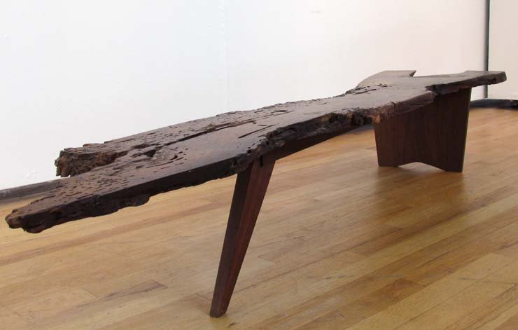 Nakashima SK-Piece Coffee Table,with extensive figuring: Artist: Nakashima, George (Japanese American, 1905 - 1990) Title: SK-Piece Coffee Table Medium: walnut Dimensions: 12 x 78.25 x 18 inches Provenance: Purchased George Nakashima Studio Showroom 1967,