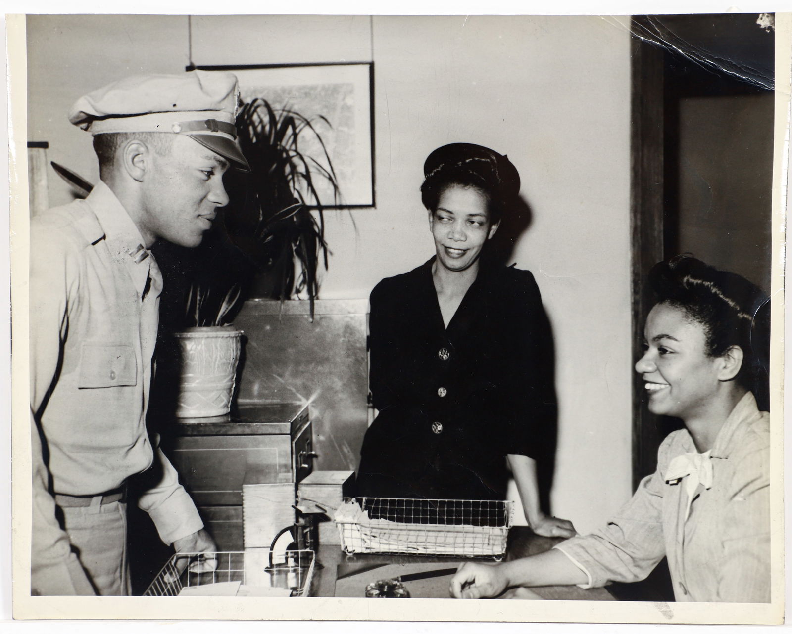 Charles Teenie Harris Photograph Soldier with Women at Office Desk (1 of 2)