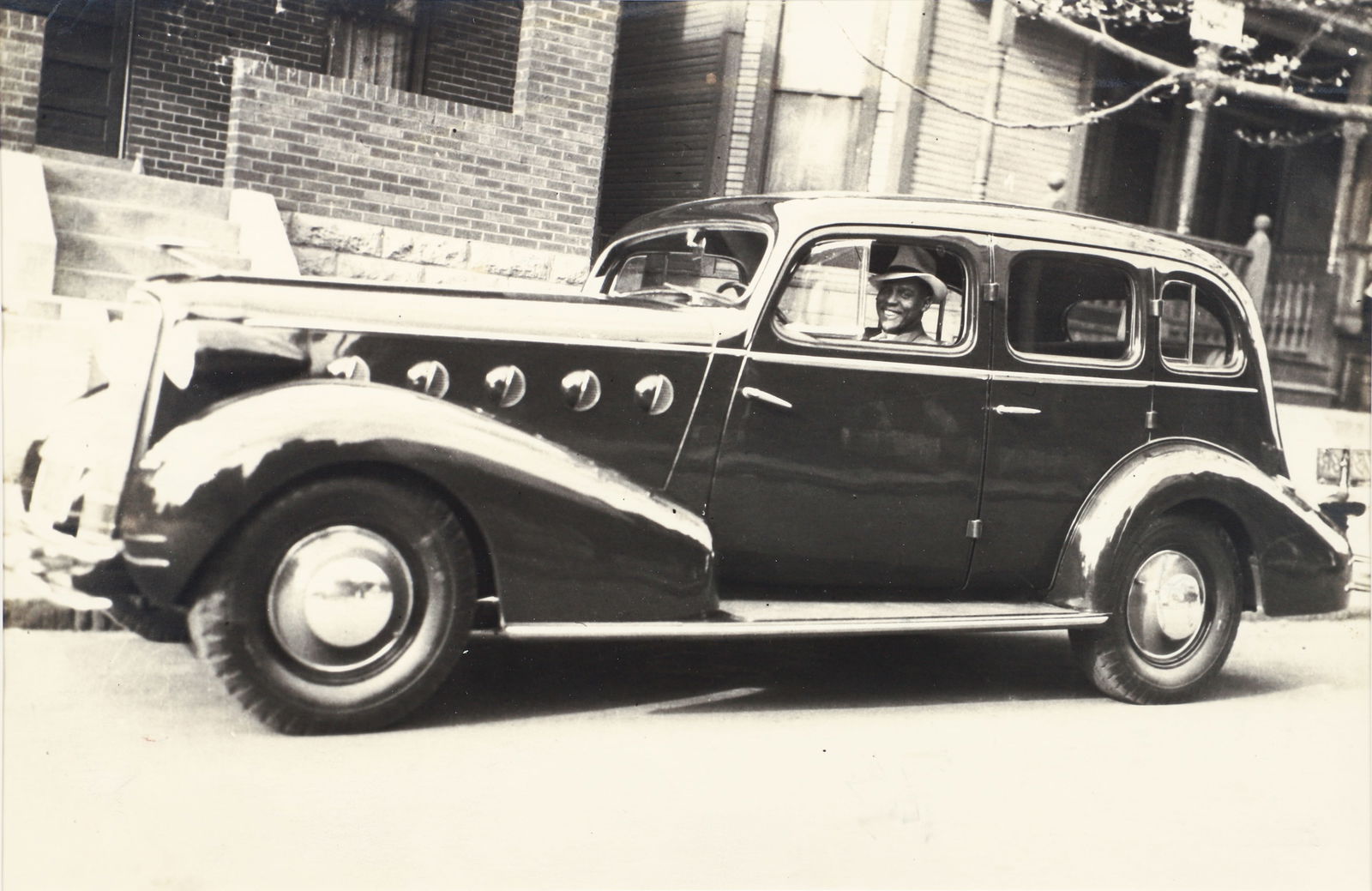 Charles Teenie Harris Photograph Man in Buick Roadmaster Sedan (1 of 2)